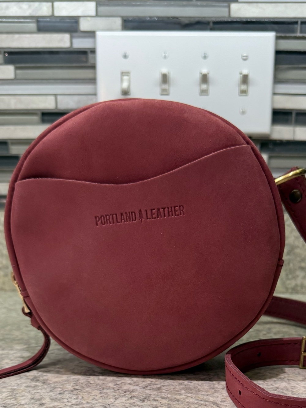 Portland Leather Foxglove small circle Crossbody Bag
